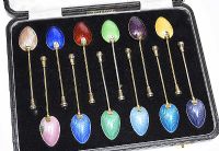 BOXED SET OF 12 STERLING SILVER GILT AND ENAMEL SPOONS at Ross's Online Art Auctions