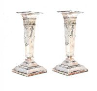TWO VERY SIMILAR ANTIQUE STERLING SILVER CANDLESTICKS at Ross's Online Art Auctions