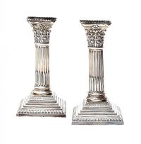 PAIR OF EDWARDIAN STERLING SILVER CORINTHIAN CANDLESTICKS at Ross's Online Art Auctions