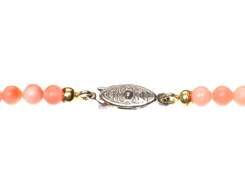 BEADED ANGELSKIN CORAL WITH A GOLD-TONE CLASP at Ross's Online Art Auctions