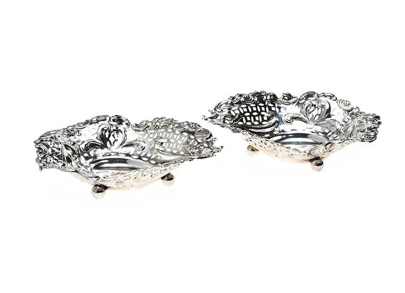 PAIR OF ANTIQUE STERLING SILVER HEART-SHAPED DISHES at Ross's Online Art Auctions