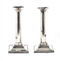 PAIR OF SILVER CANDLESTICKS COMPLETE WITH DRIP TRAYS AND LOADED BASES at Ross's Online Art Auctions