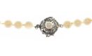 STRAND OF CULTURED PEARLS WITH SILVER-TONE CLASP at Ross's Online Art Auctions