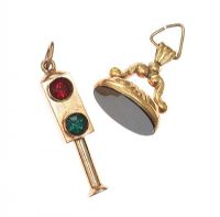 TWO 9CT GOLD FOBS / CHARMS, ONE SET WITH ONYX at Ross's Online Art Auctions