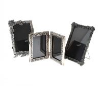THREE VINTAGE SILVER-TONE PHOTO FRAMES at Ross's Online Art Auctions