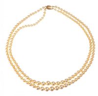DOUBLE STRING OF SIMULATED PEARLS WITH 9CT GOLD CLASP at Ross's Online Art Auctions