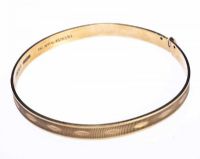 ENGRAVED GOLD BANGLE at Ross's Online Art Auctions