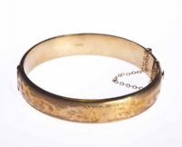 GOLD BANGLE at Ross's Online Art Auctions