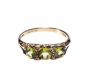 GOLD & PERIDOT THREE STONE RING at Ross's Online Art Auctions