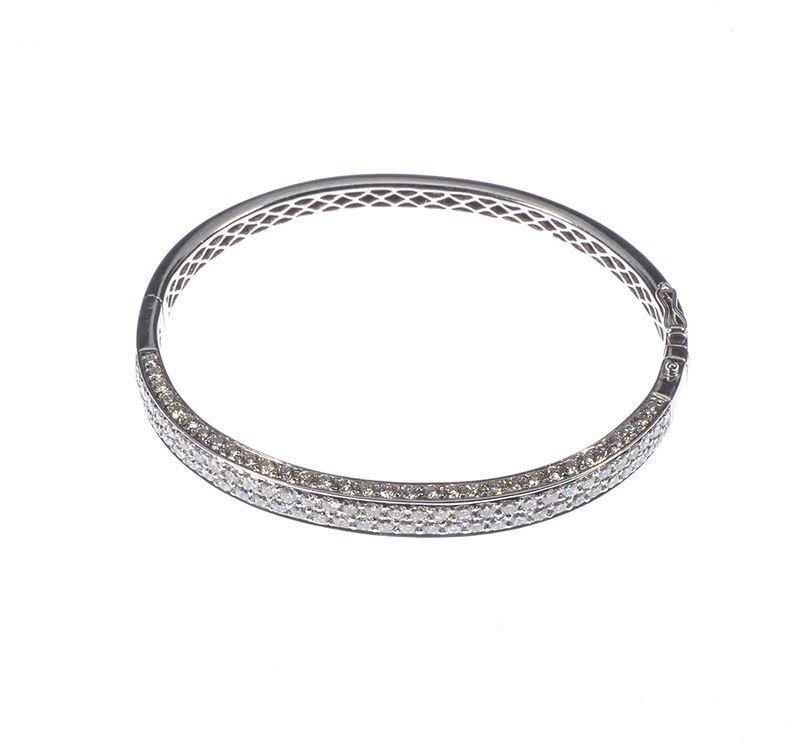 18 CARAT WHITE GOLD DIAMOND ENCRUSTED BANGLE at Ross's Online Art Auctions