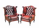 PAIR OF DEEP BUTTONED LEATHER WINGED BACK ARMCHAIRS at Ross's Online Art Auctions