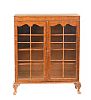 WALNUT TWO DOOR BOOKCASE at Ross's Online Art Auctions