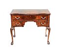 MAHOGANY SERPENTINE FRONT DESK at Ross's Online Art Auctions