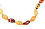 A STRING OF AMBER & CITRINE BEADS at Ross's Online Art Auctions