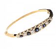 18CT GOLD SAPPHIRE & DIAMOND BANGLE at Ross's Online Art Auctions