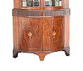 A NINETEENTH CENTURY MAHOGANY AND INLAID BOW FRONT STANDING CORNER CUPBOARD at Ross's Online Art Auctions