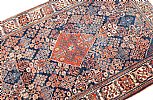 A PERSIAN RUG at Ross's Online Art Auctions