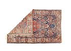 A PERSIAN RUG at Ross's Online Art Auctions