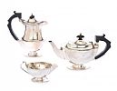A THREE PIECE SILVER TEA SERVICE at Ross's Online Art Auctions