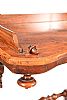 A VICTORIAN WALNUT CANTERBURY at Ross's Online Art Auctions