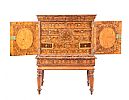 A WILLIAM & MARY WALNUT OYSTER VENEERED CABINET ON STAND at Ross's Online Art Auctions
