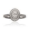 PLATINUM DIAMOND HALO RING at Ross's Online Art Auctions