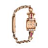 14CT ROSE GOLD CASED RUBY & DIAMOND LADY'S WRISTWATCH at Ross's Online Art Auctions