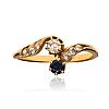 18CT GOLD SAPPHIRE & DIAMOND CROSSOVER RING at Ross's Online Art Auctions